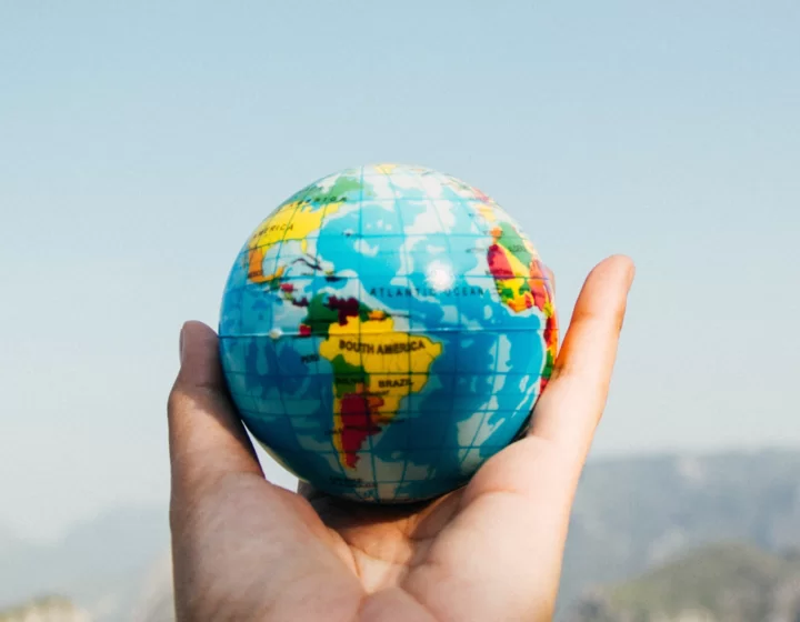 Globe held in hand