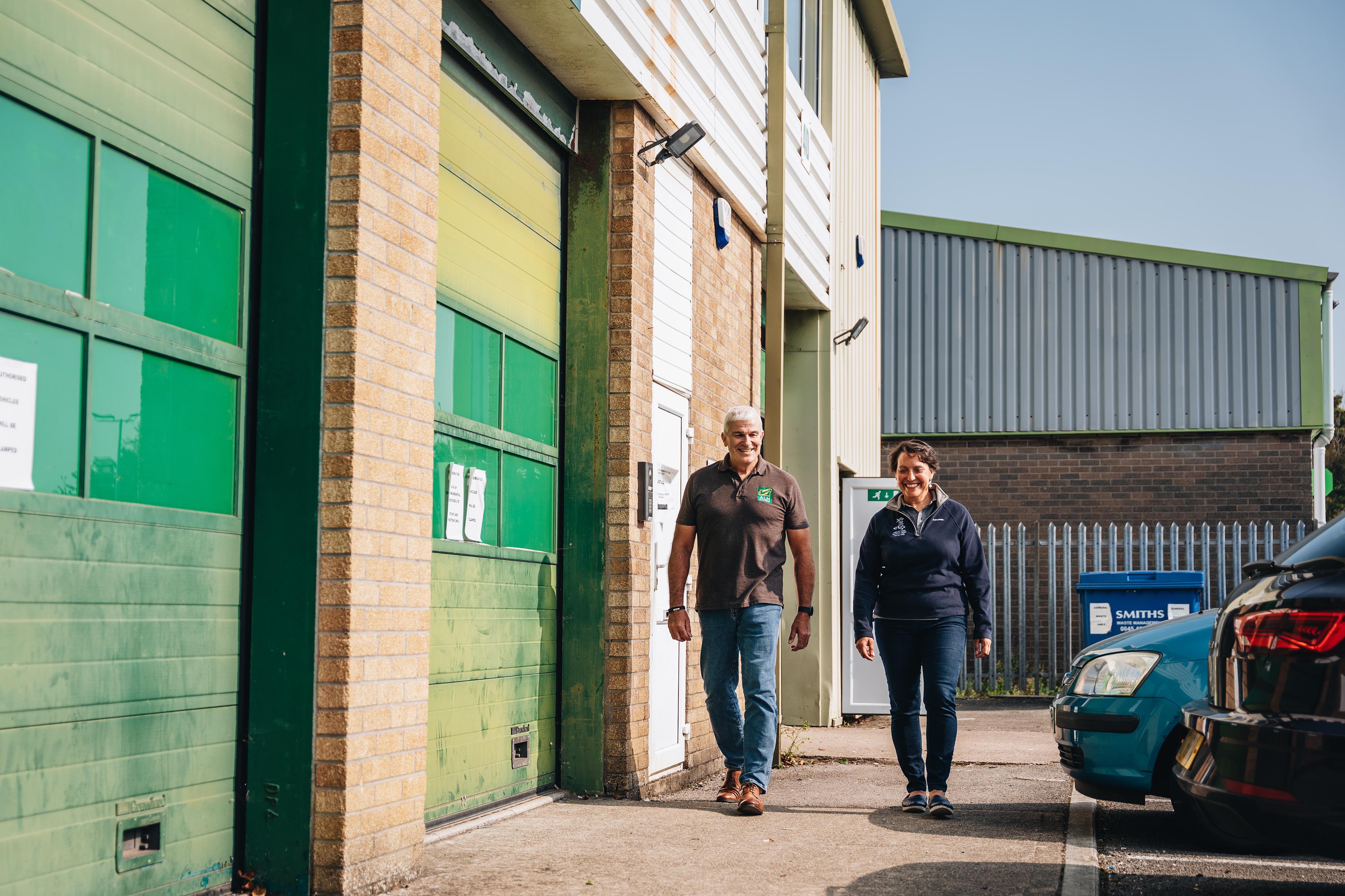 Louise Tambini, Keep Wales Tidy Deputy CEO walking into AL&H Envrionmental, WEEE partner business